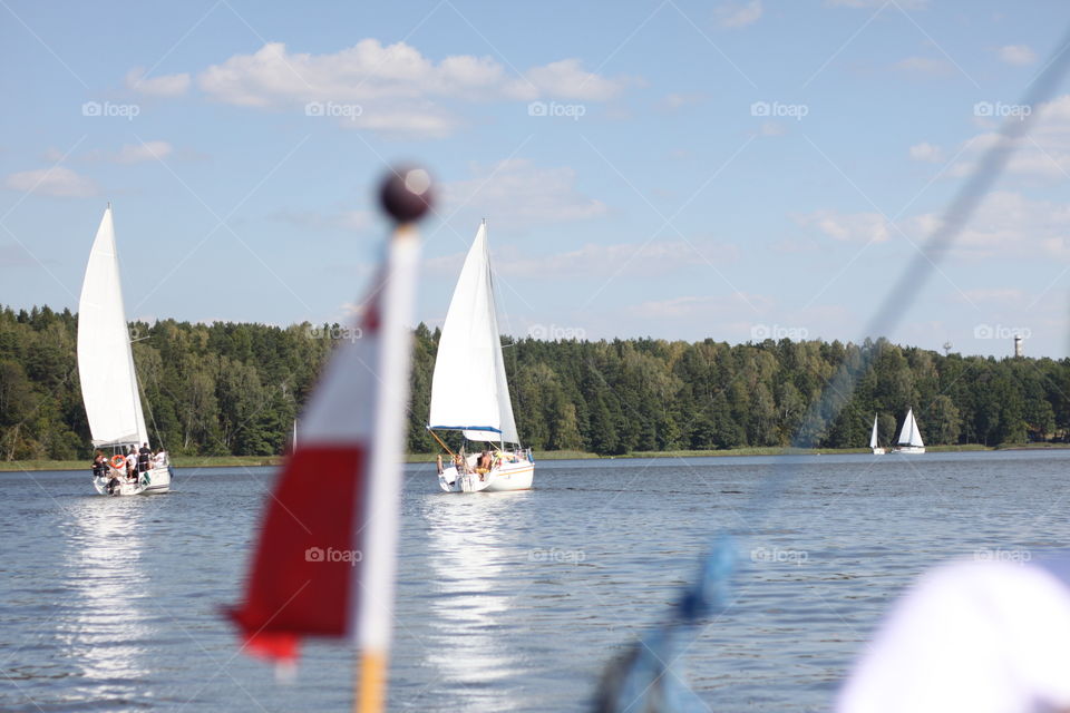 let's go vacation in a boat at river n sea side with family friends having fun
