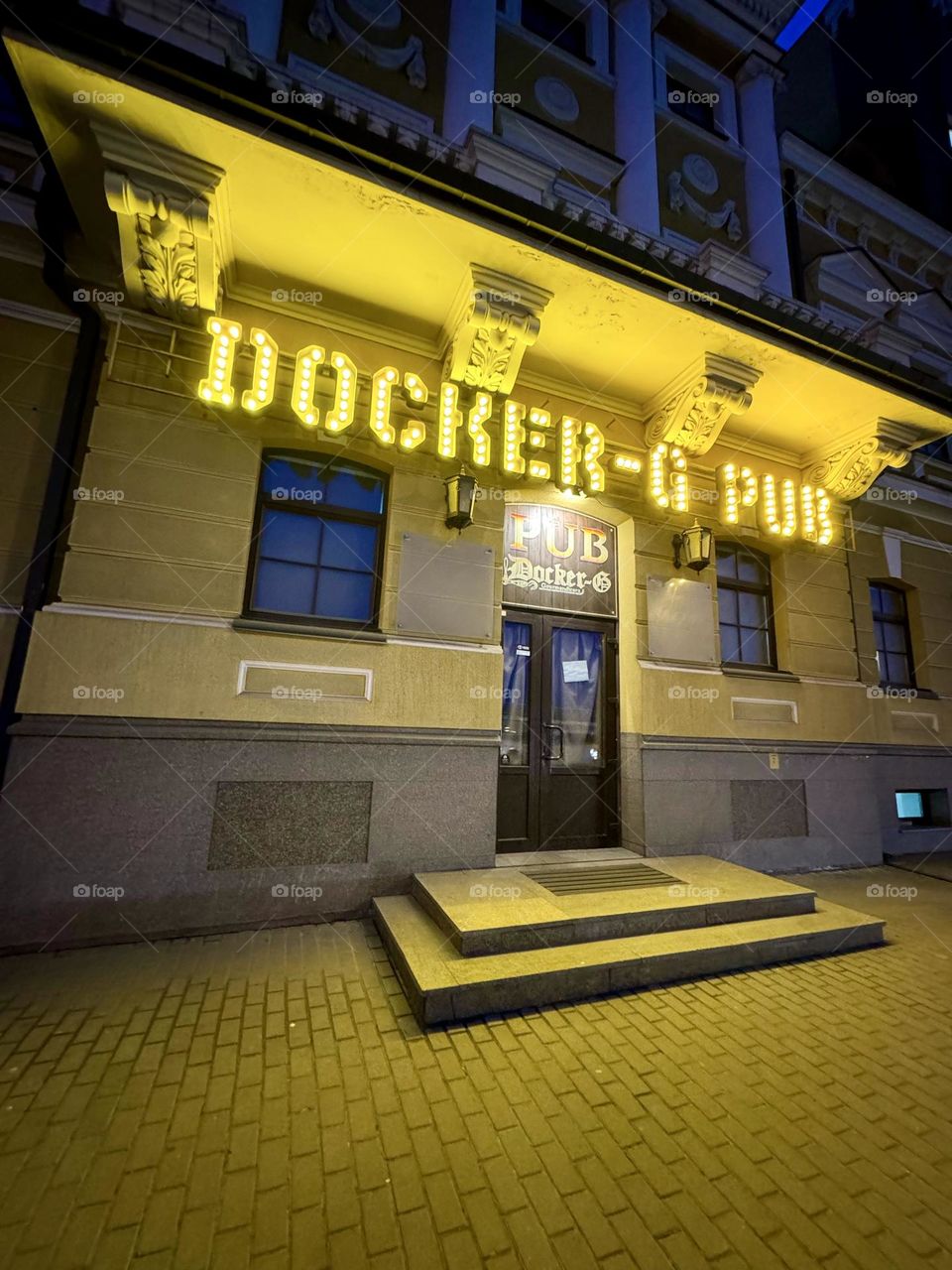 Cozy street with glowing lights in Kyiv