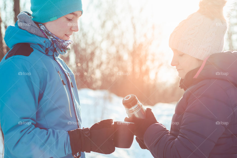 Break for hot drink during the winter trip