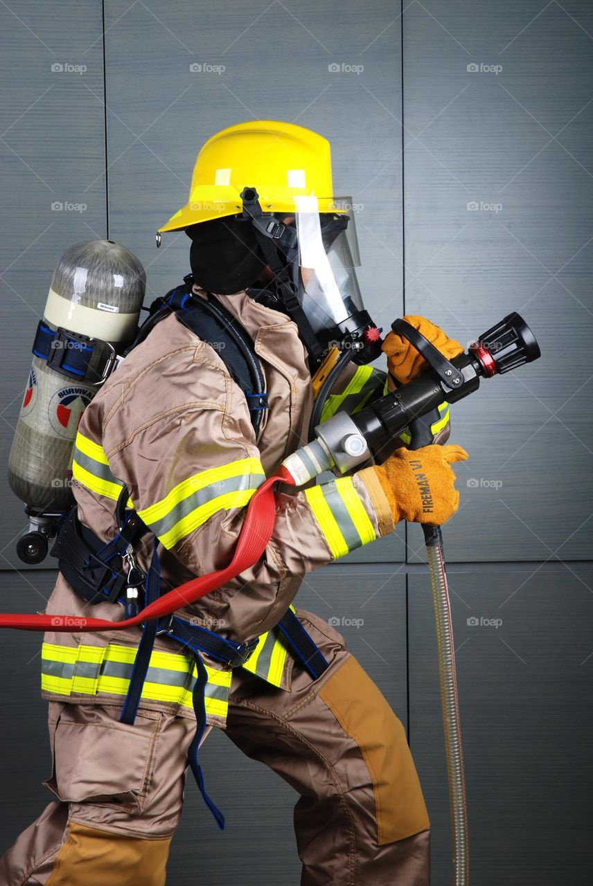 firefighter with fireproof suit