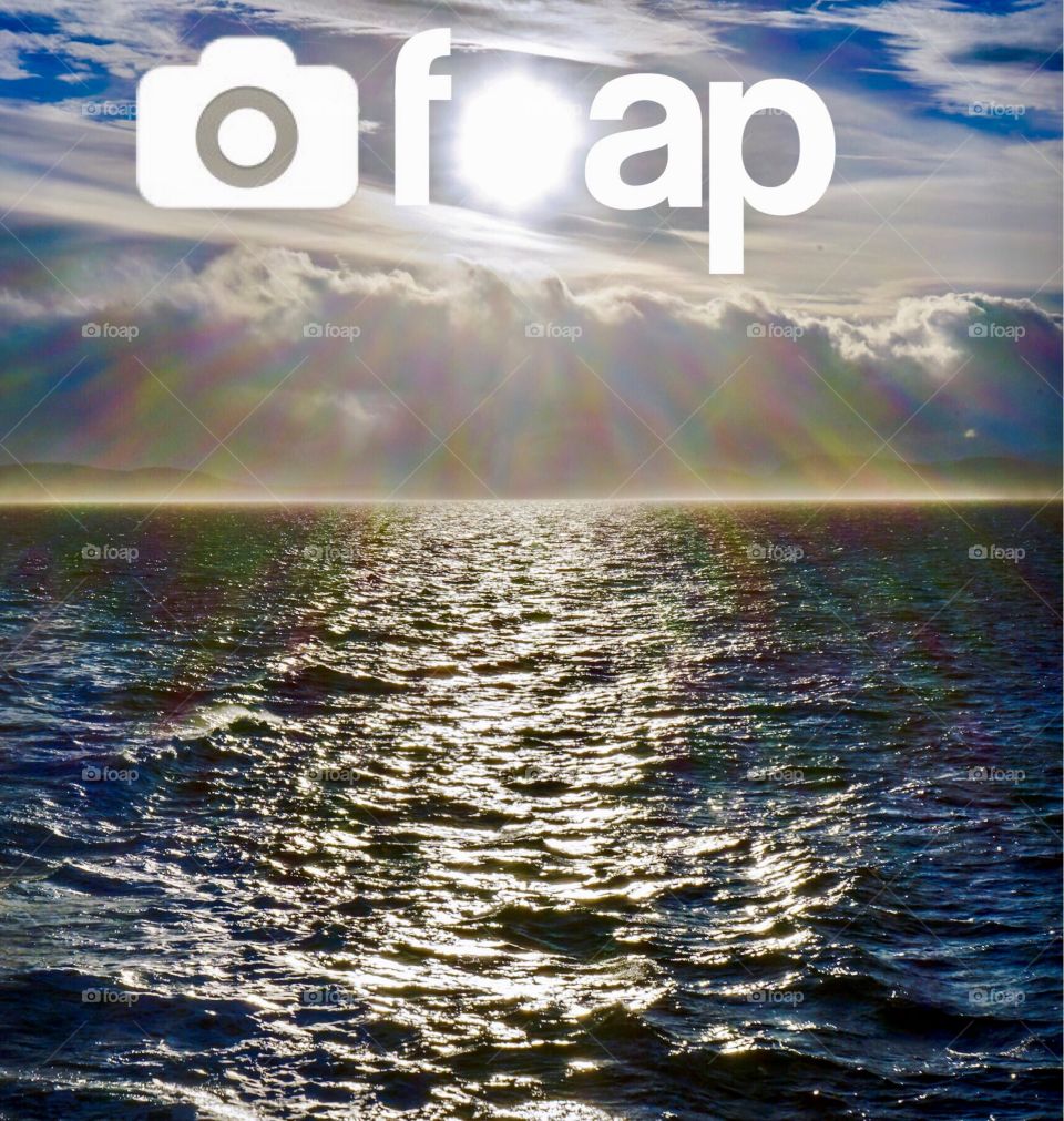 Foap logo shines over the ocean