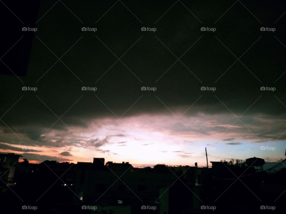 monsoon clouds engulfing the horizon