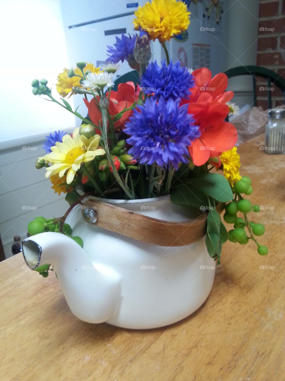 flowers in a teapot