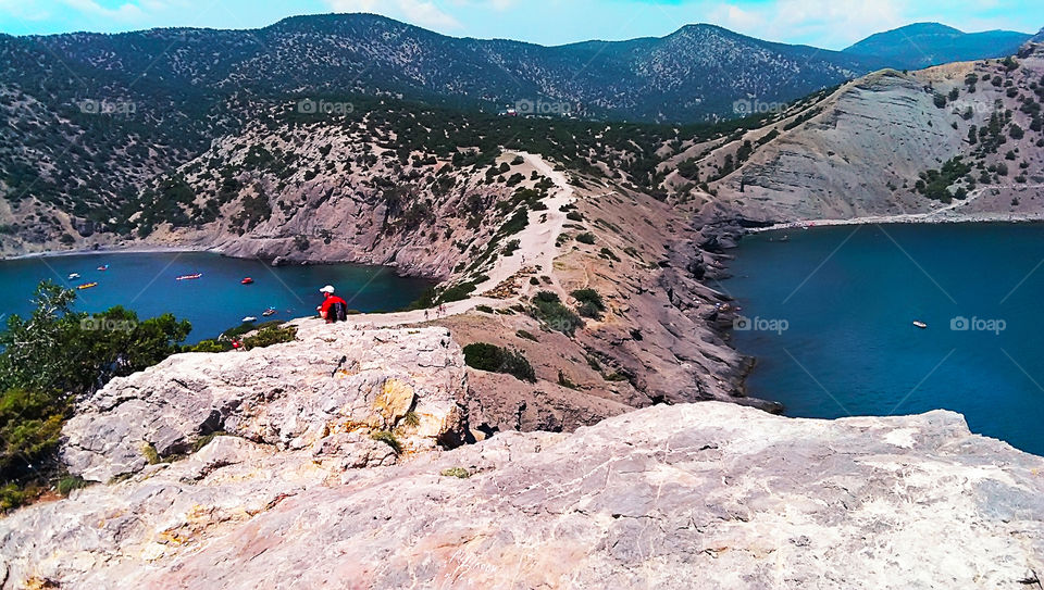 Amazing epic Traveling through the mountains surrounded by the sea water from the both sides 