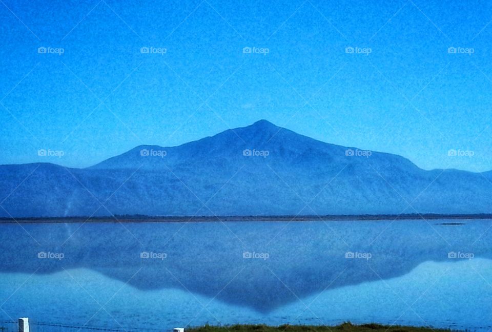 Reflection of the mountain in the water,reflection,Mountain,water,seeing double,double,nature,landscape,sky,blue