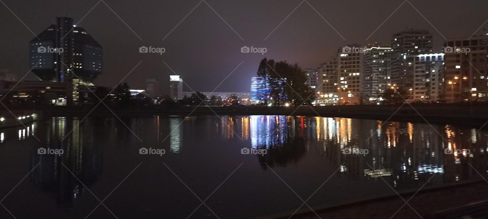 night city wiev beautiful lights and reflection in river