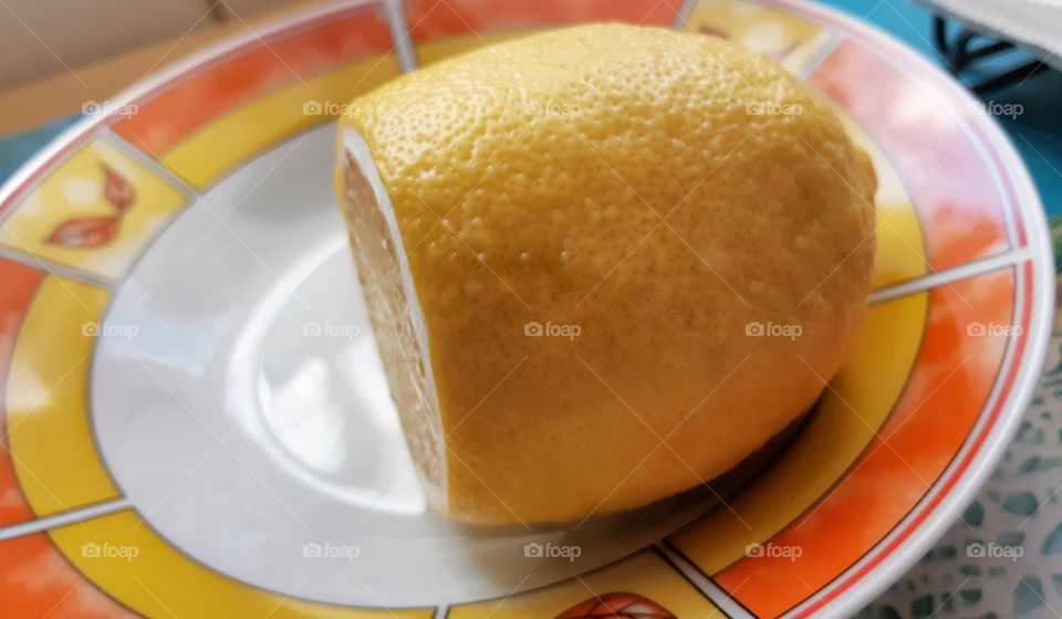 Cut lemon on a plate