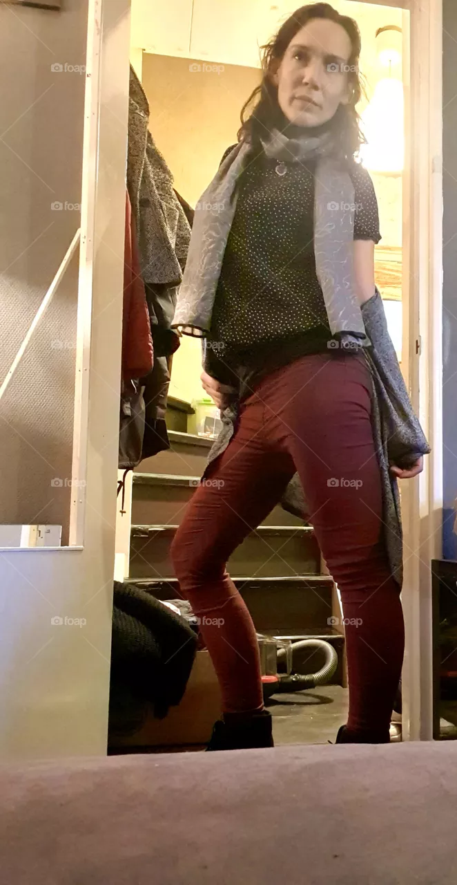 woman in doorway. home