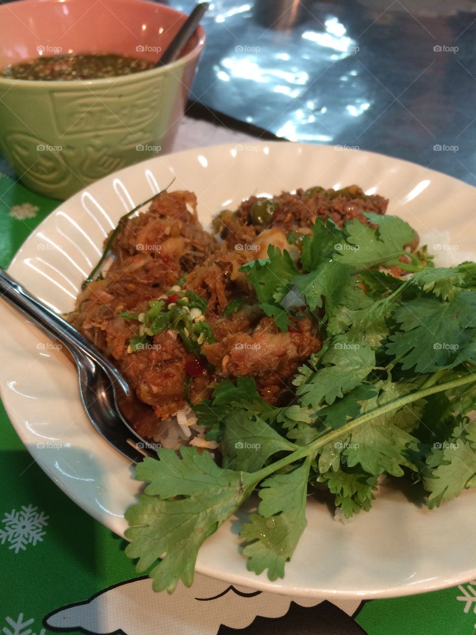 Coriander always good with spicy stir fry pork or beef and rice