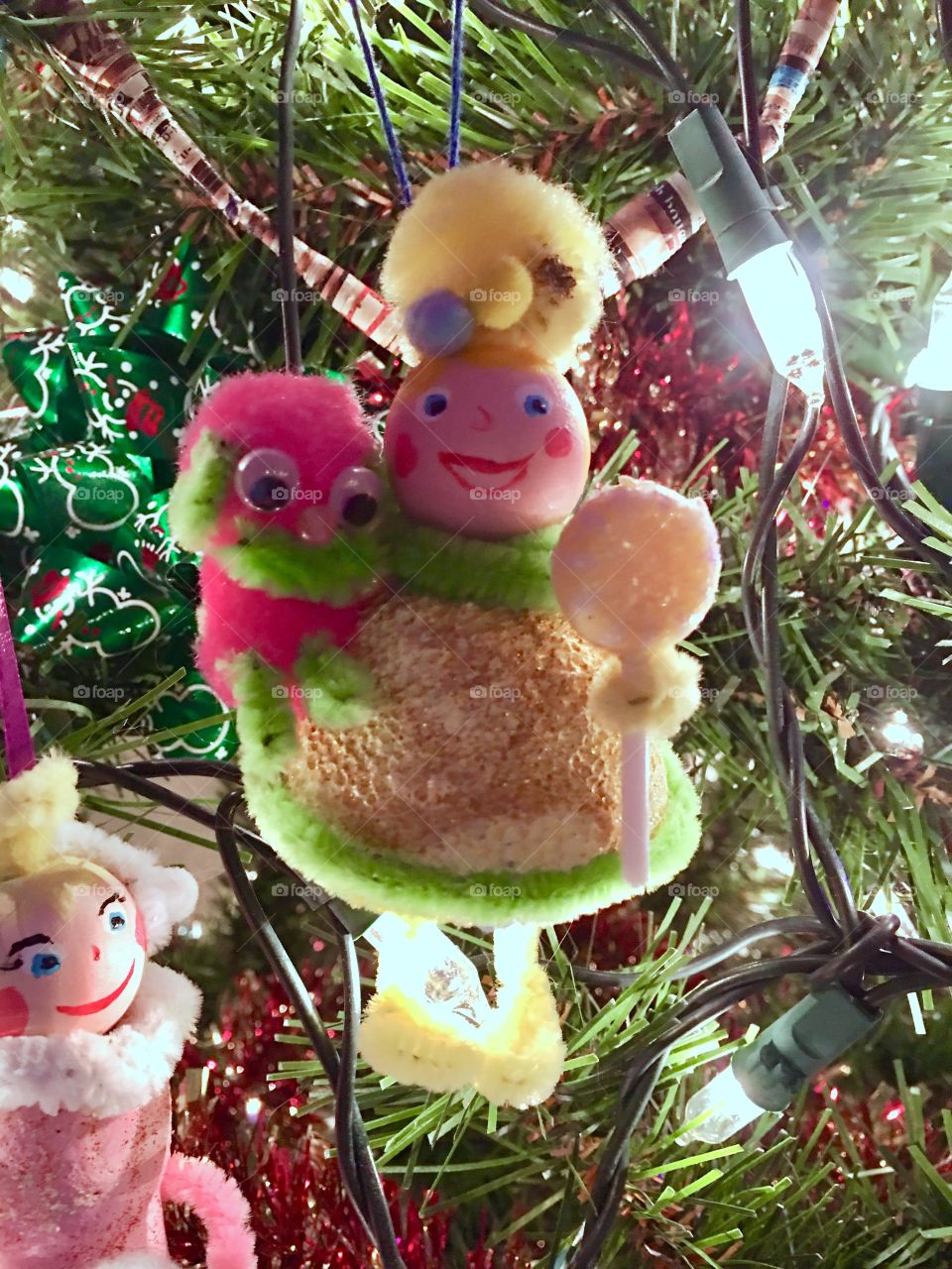 Little girl with toy and candy