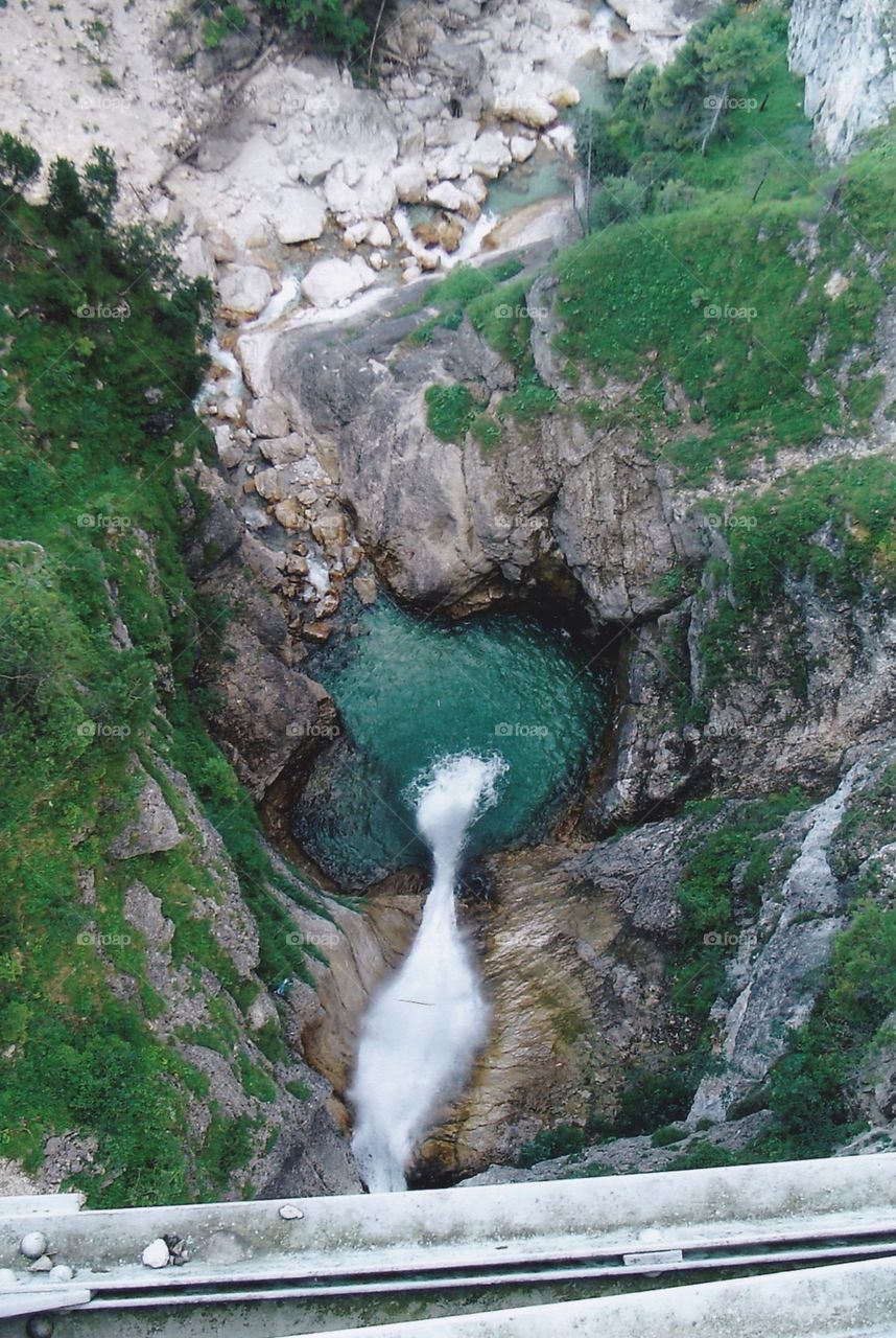 Neuschwanstein Waterfall. Looking down at the waterfall behind the Neuschwanstein castle in Hohenschwangau valley Germany. 