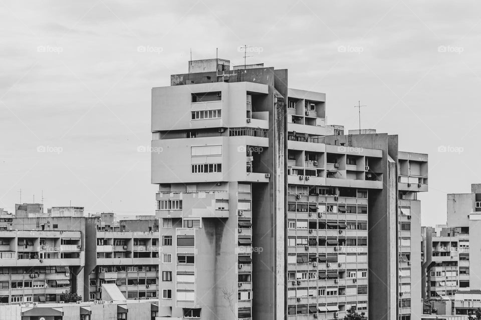 Black and white photo of concrete residential buildings built in brutalist architecture style in Split, Croatia