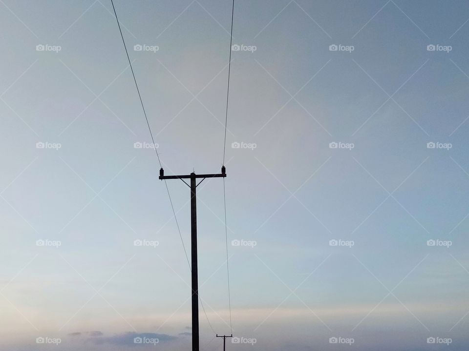 electric pole with sky