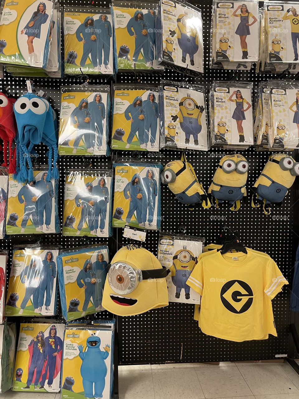 Shopping in the Halloween Store, looking for costumes, finding costumes in the Halloween Store, dressing up in costumes minion costumes 