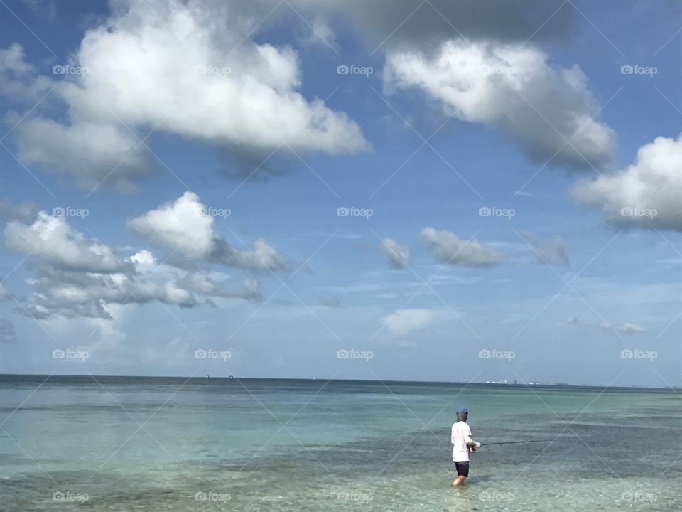 Angler wading the flats