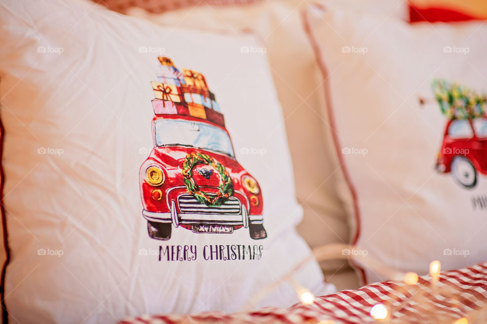 Christmas decorated pillow, festive atmosphere. Home decor.