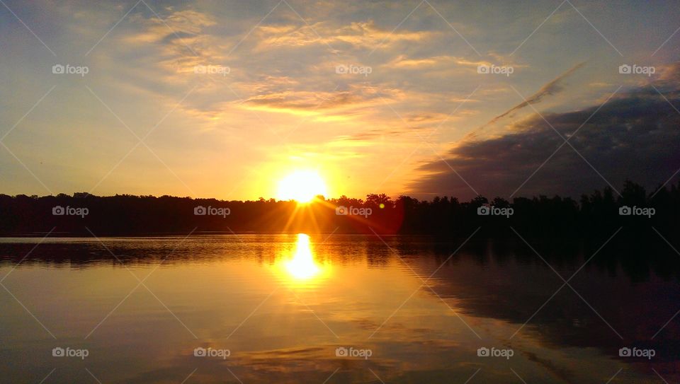 Sunset over the beautiful lake