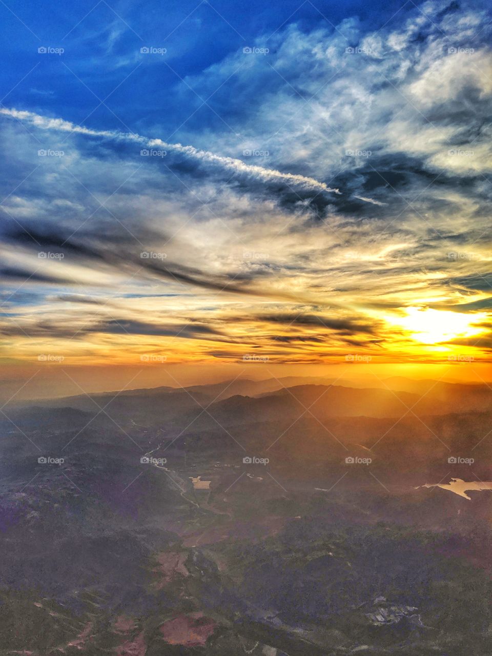 Bold, colorful and dramatic clouds during a sunset at a higher altitude.