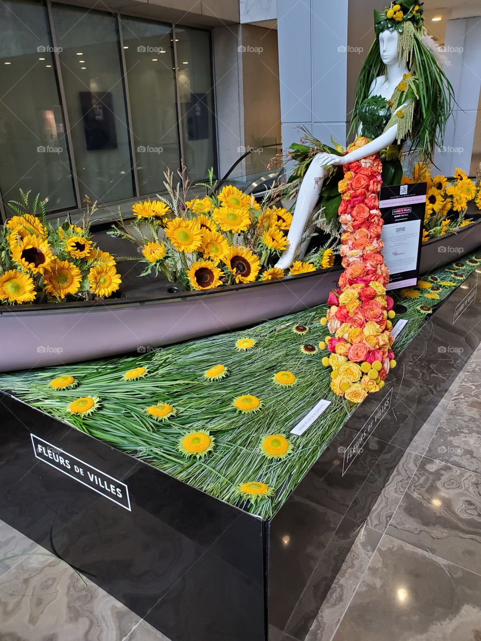 mannequin in a floral boat