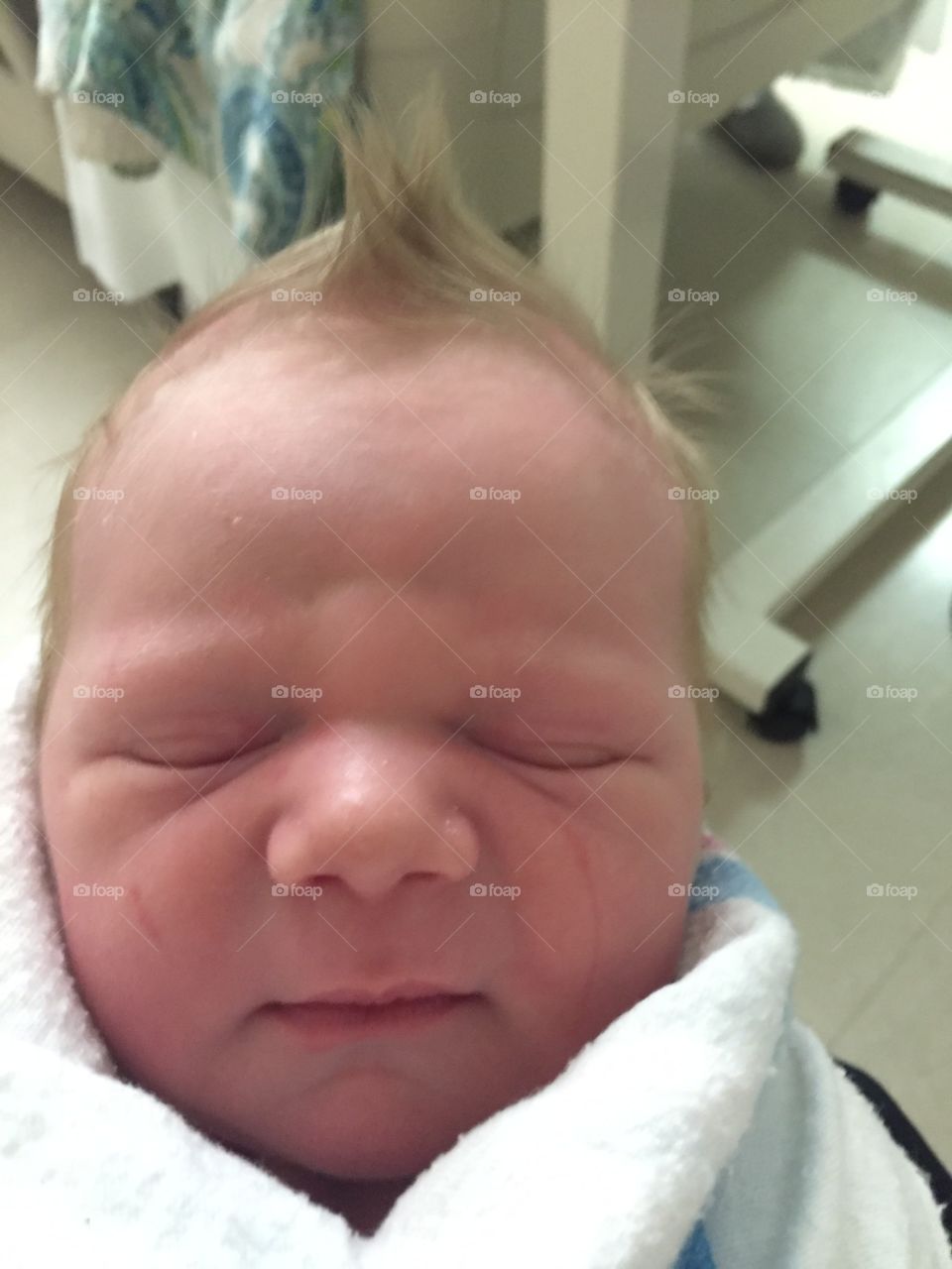 Newborn baby with cute Mohawk 