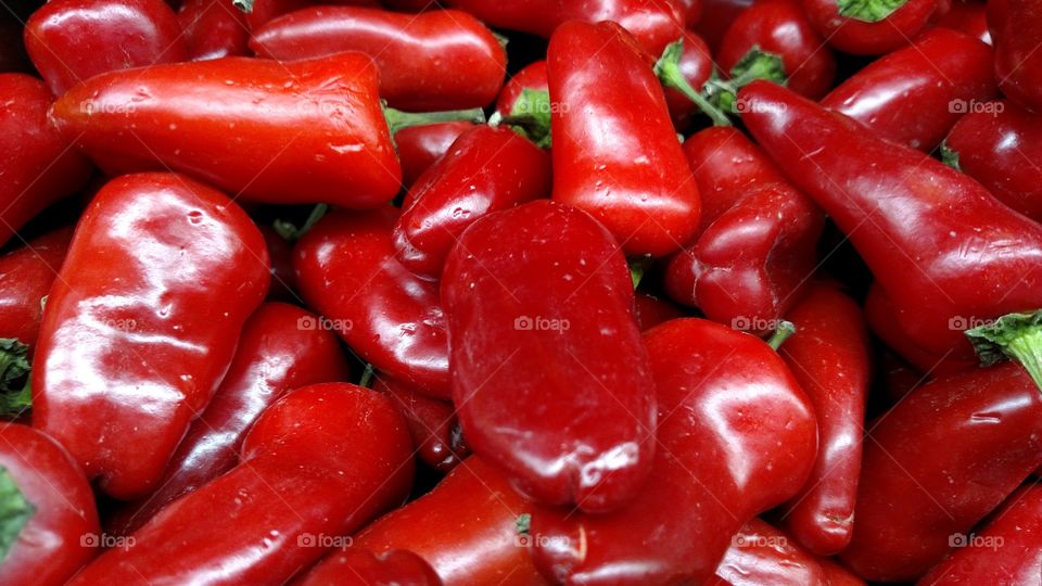 Shiny red peppers.