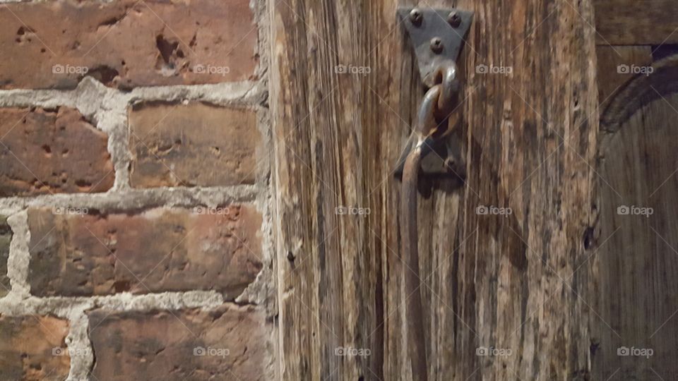 brick and wood with latch