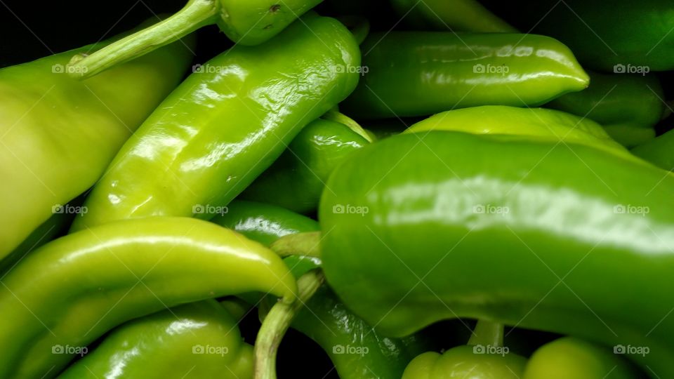Fresh green market peppers.