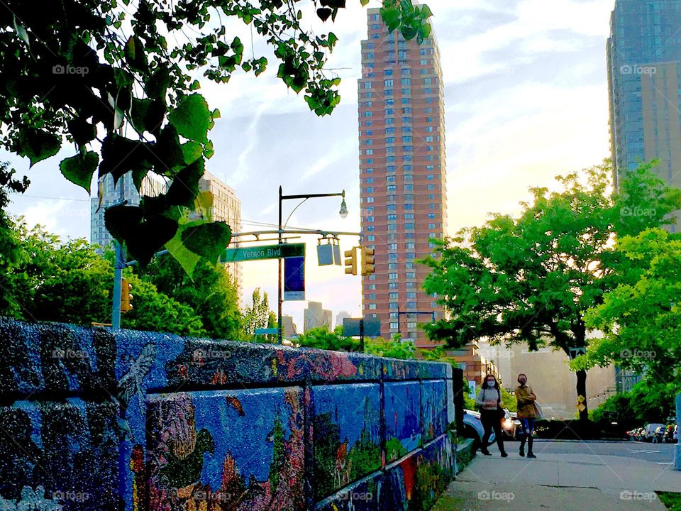 A wall completely covered in graffiti art leads up to “Vernon Jackson Avenue” on “48th Street” in LIC, Queens. 2020. Hypnotic Productions