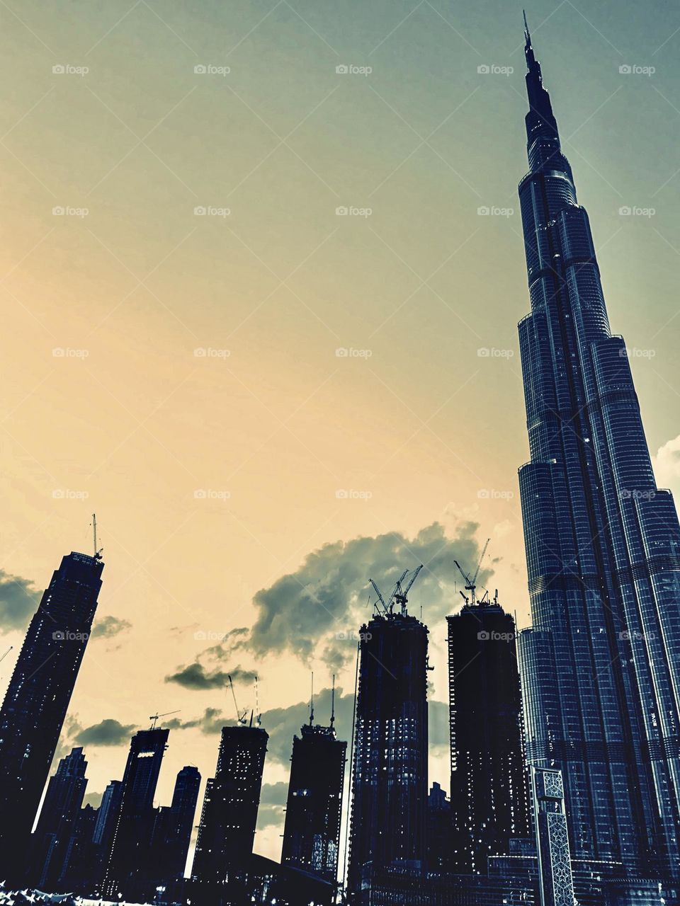 Grow up skyscraper at sunset. Dubai 