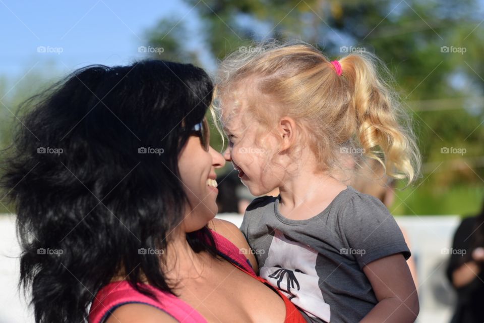 Close-up of cute girl with her mother