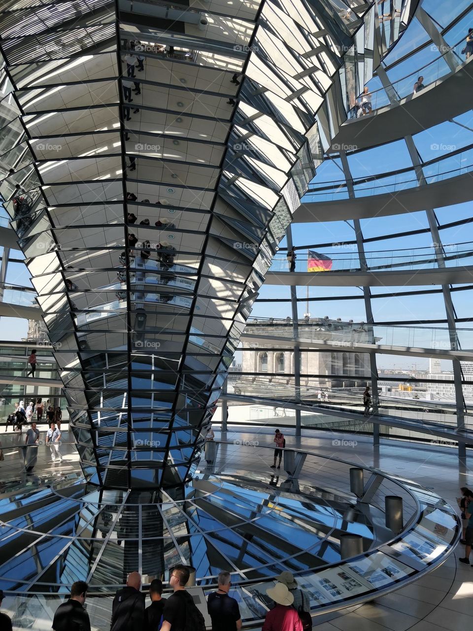 Tourists around the glittery cone inside the Reichstag dome, Berlin