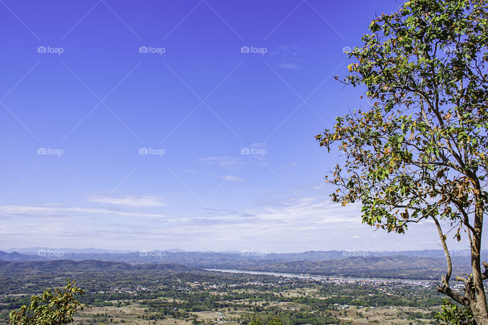 Cityscape chiangkhan along the Mekong River and mountain view point at Phu Thok , Loei in Thailand.