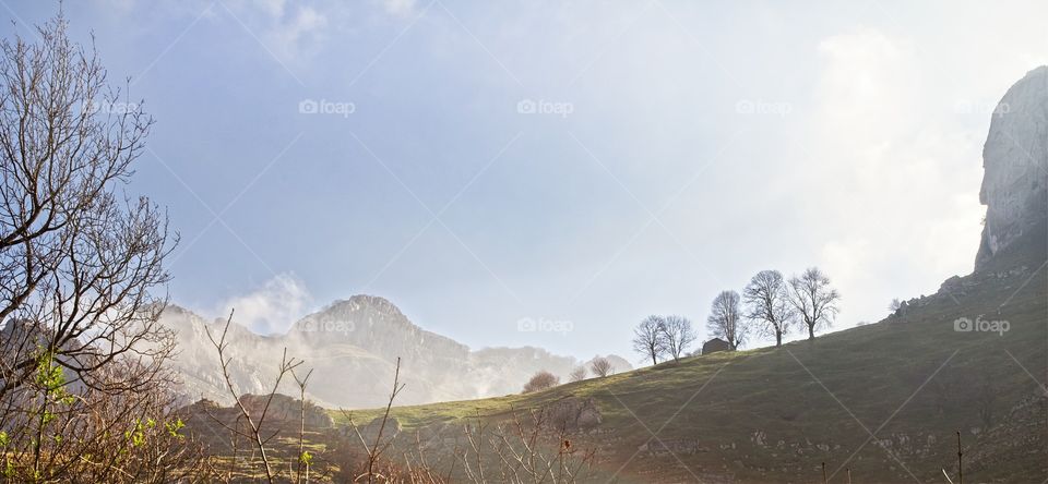 View of mountain in foggy weather