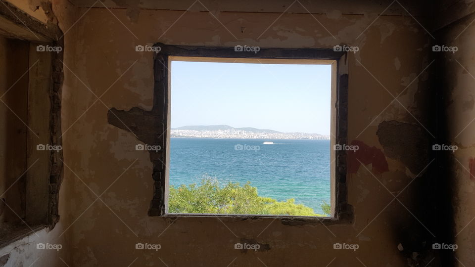 Window Painting Illusion. An abandoned building on one of the Princes Islands. It looks like a painting, but is just a glassless window.
