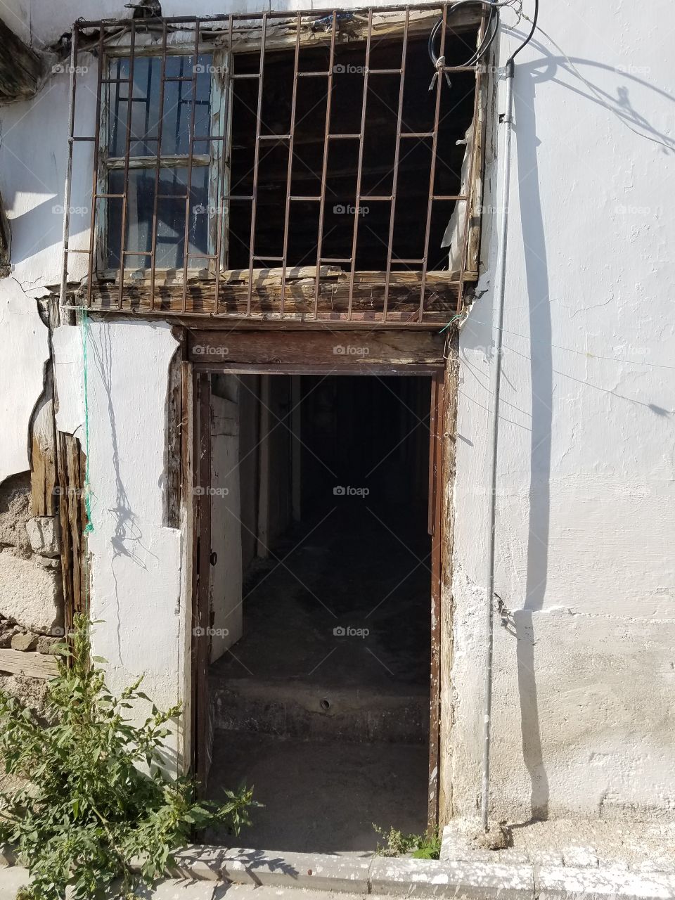 a broken old doorway leading to another and another in Ankara Turkey in the castle