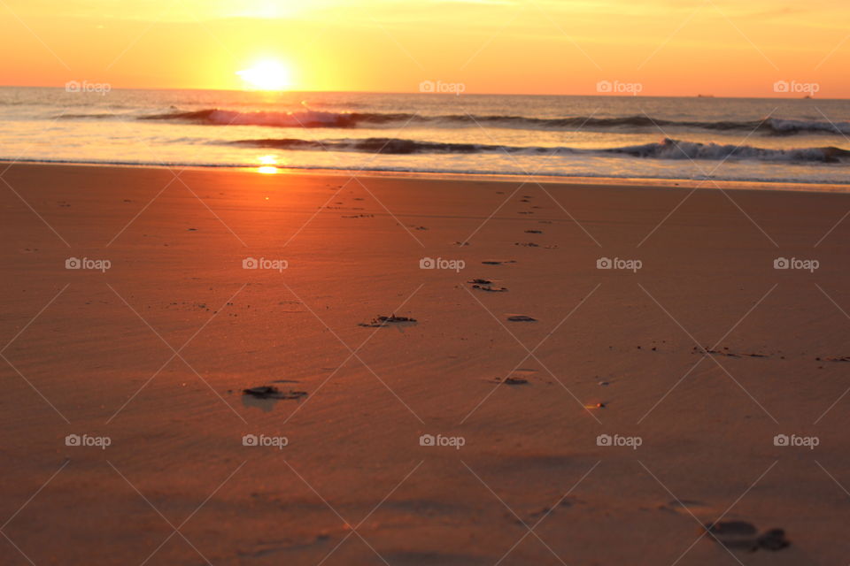 View of beach during sunset