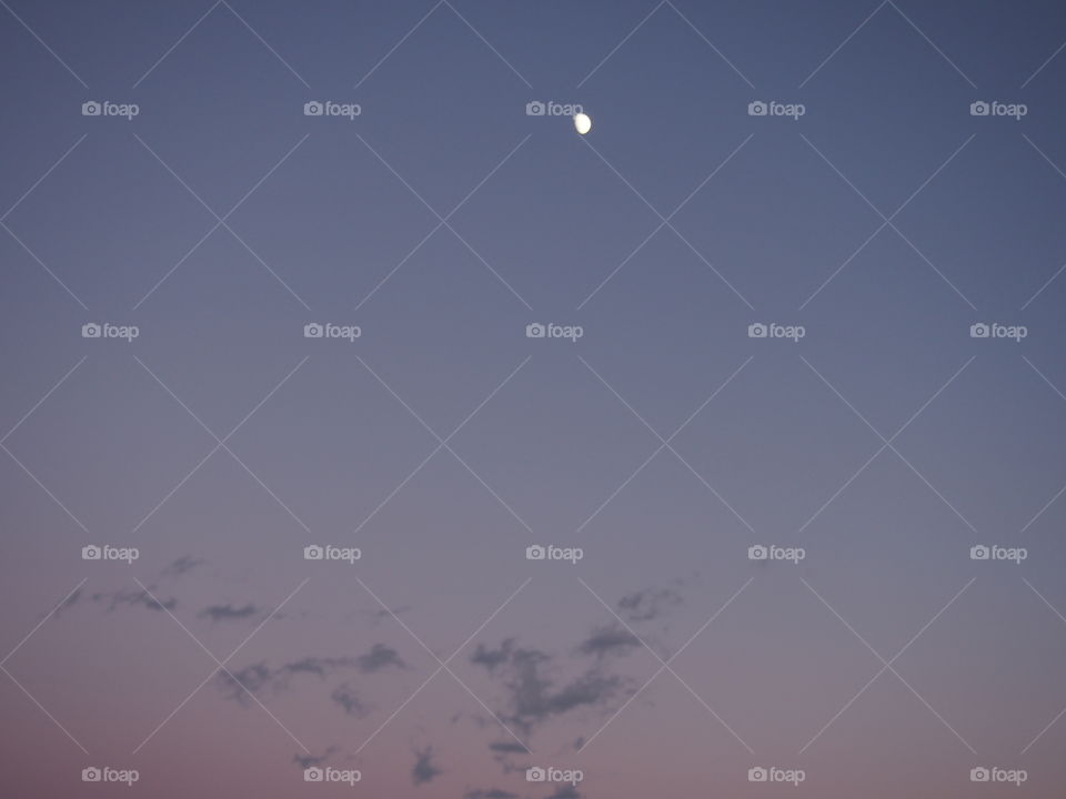 Low angle view of moon in sky