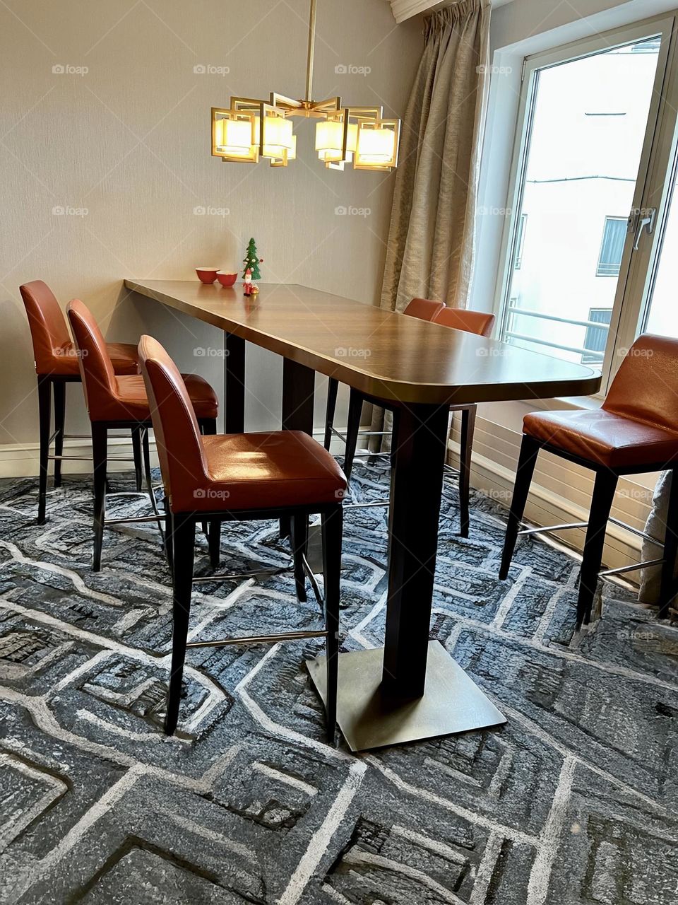 High dining table near the window