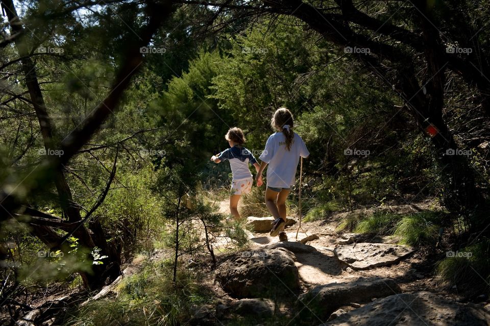 Two young girls on a mountain hike