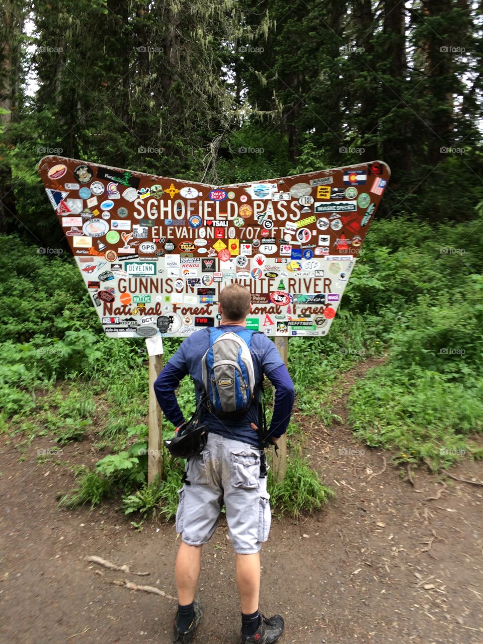 Marketing at the Top. Stickers galore on this sign during out mountain bike ride on the 401 trail