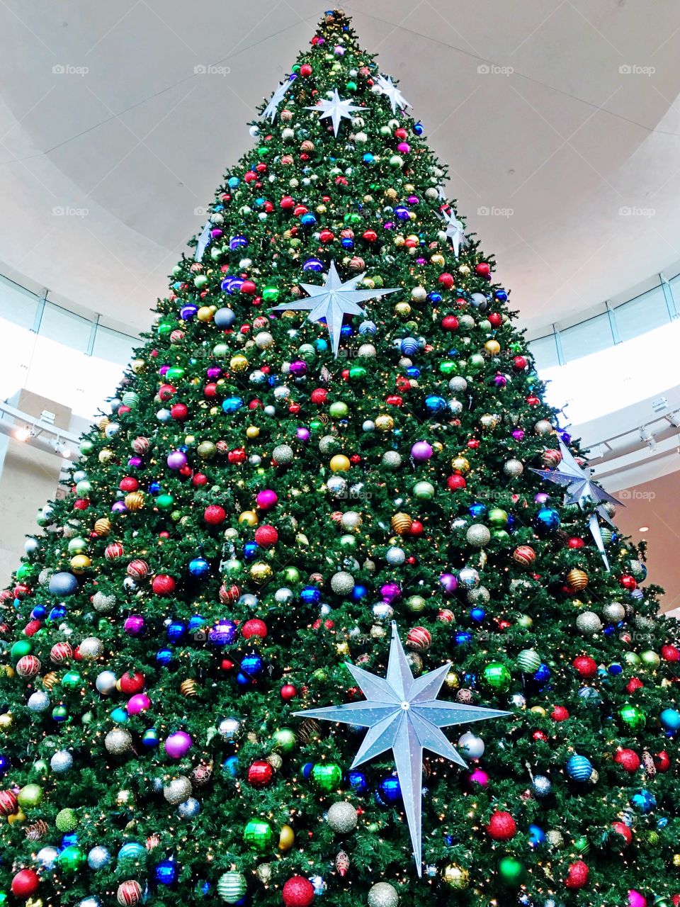 giant christmas tree w bulbs & stars...millennia mall orlando fl