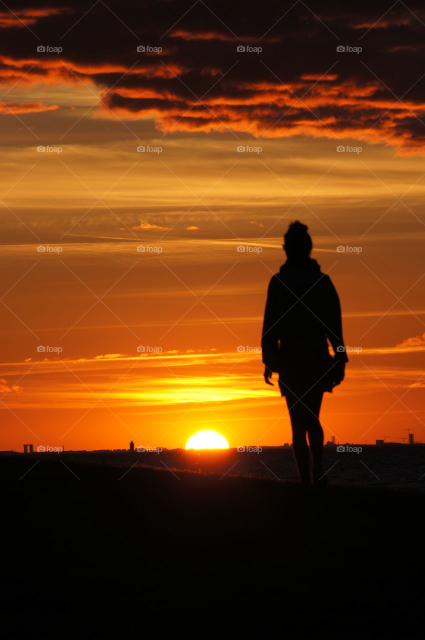 Girl in sunset