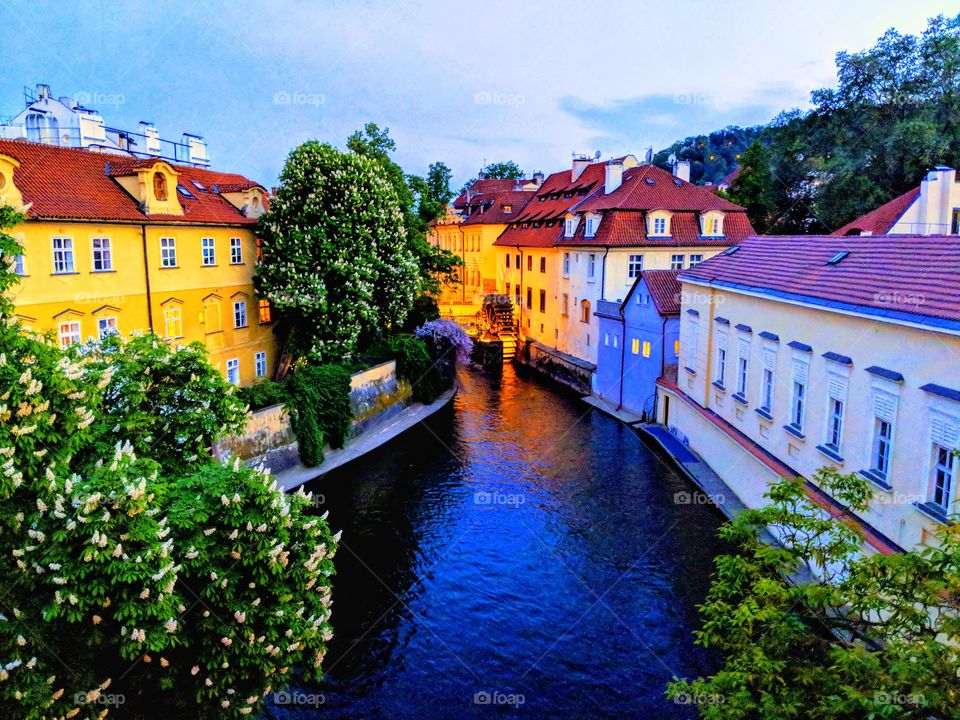 Beautiful evening along Charles Bridget in the city of Prague