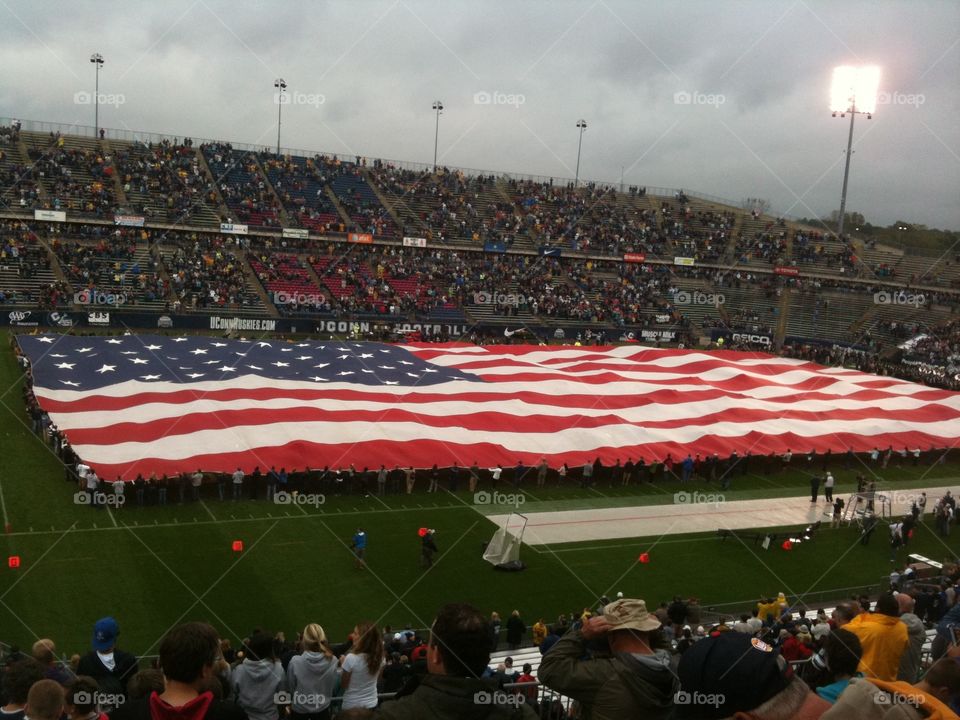 American flag on the football field 