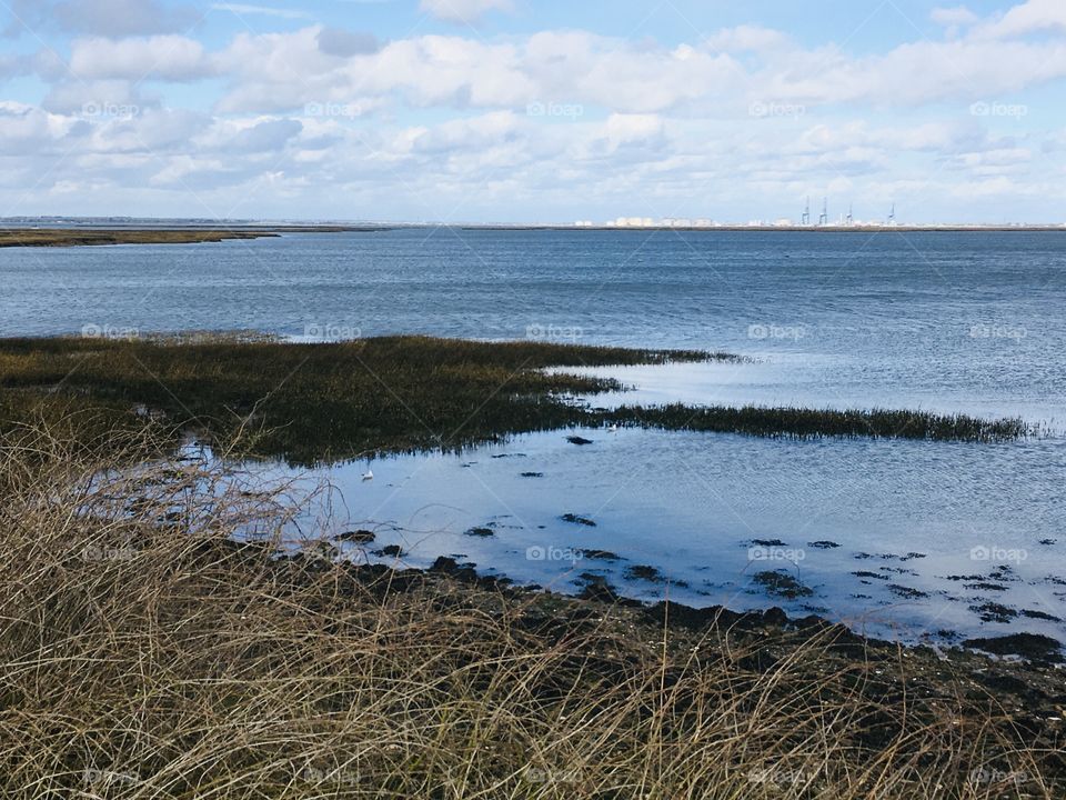 A beautiful English riverside view, across the marshes on a crisp chilly day. 