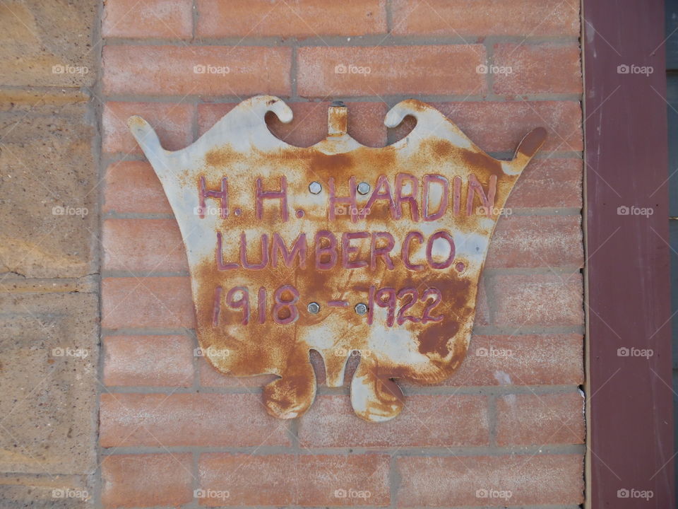 vintage lumberyard sign. This is a picture of a sign showing when this building was established