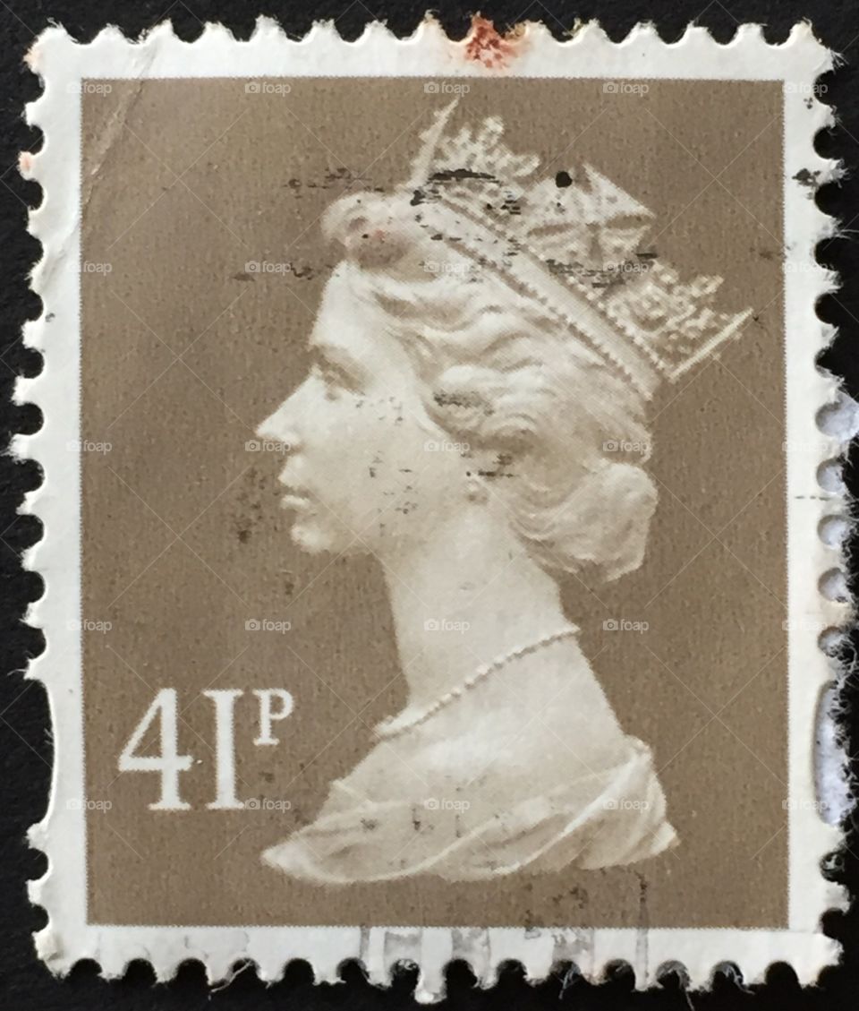 British 41p stamp on beige brown background 