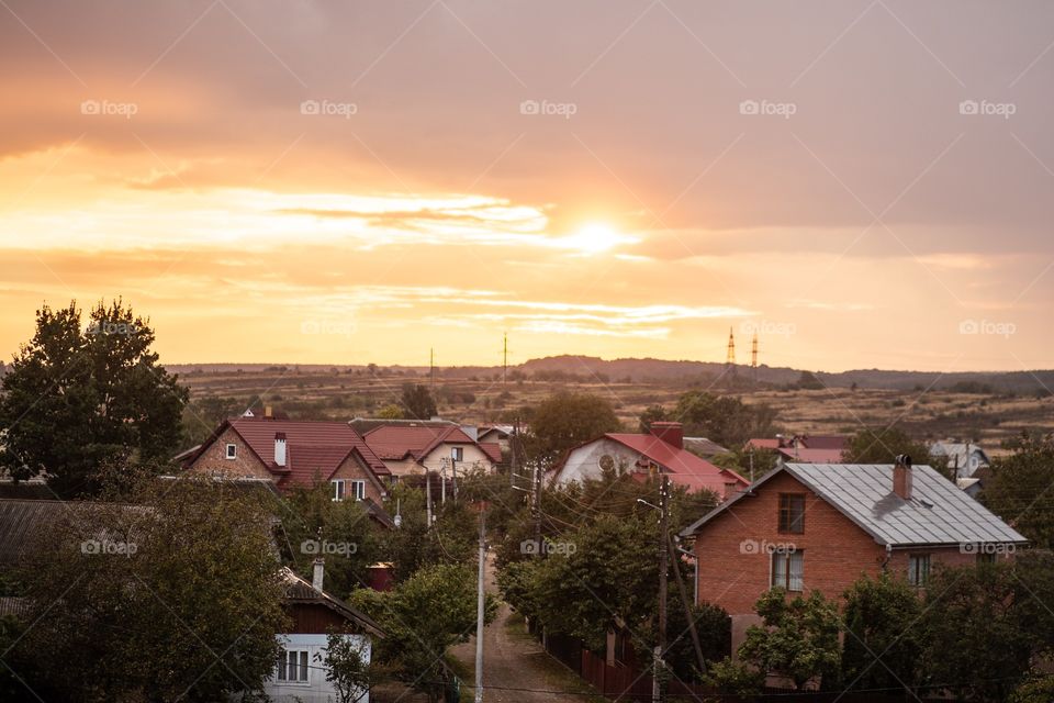 landscape overlooking sunset in a mountain valley