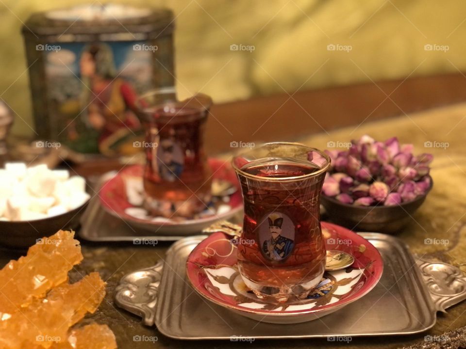 Iran has a rich culture of hospitality. Guests are welcome and considered as God's blessing. Tea, especially well-brewed Persian tea, is a popular drink offered to guests. There are some items that many Iranians might find nostalgic in this photo.