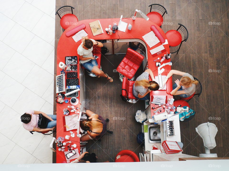 cosmetic services for girls in the mall, top view